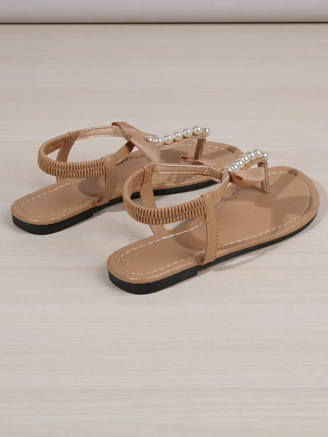 OYOANGLE Women's Pearl Decor Bowknot Ankle Straps Flat Sandals Solid Plain Open Toe Leather Thong Sandals